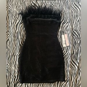 Black strapless Aqua dress.